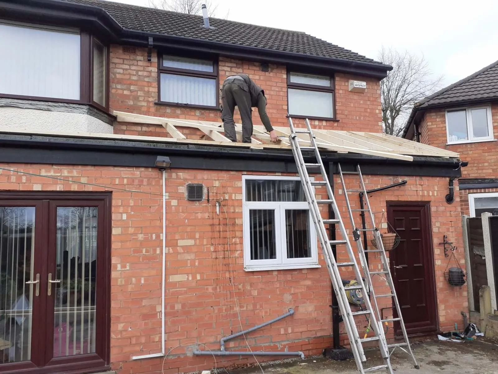 Westridge Roofing team working on a residential re-roof in the Midlands