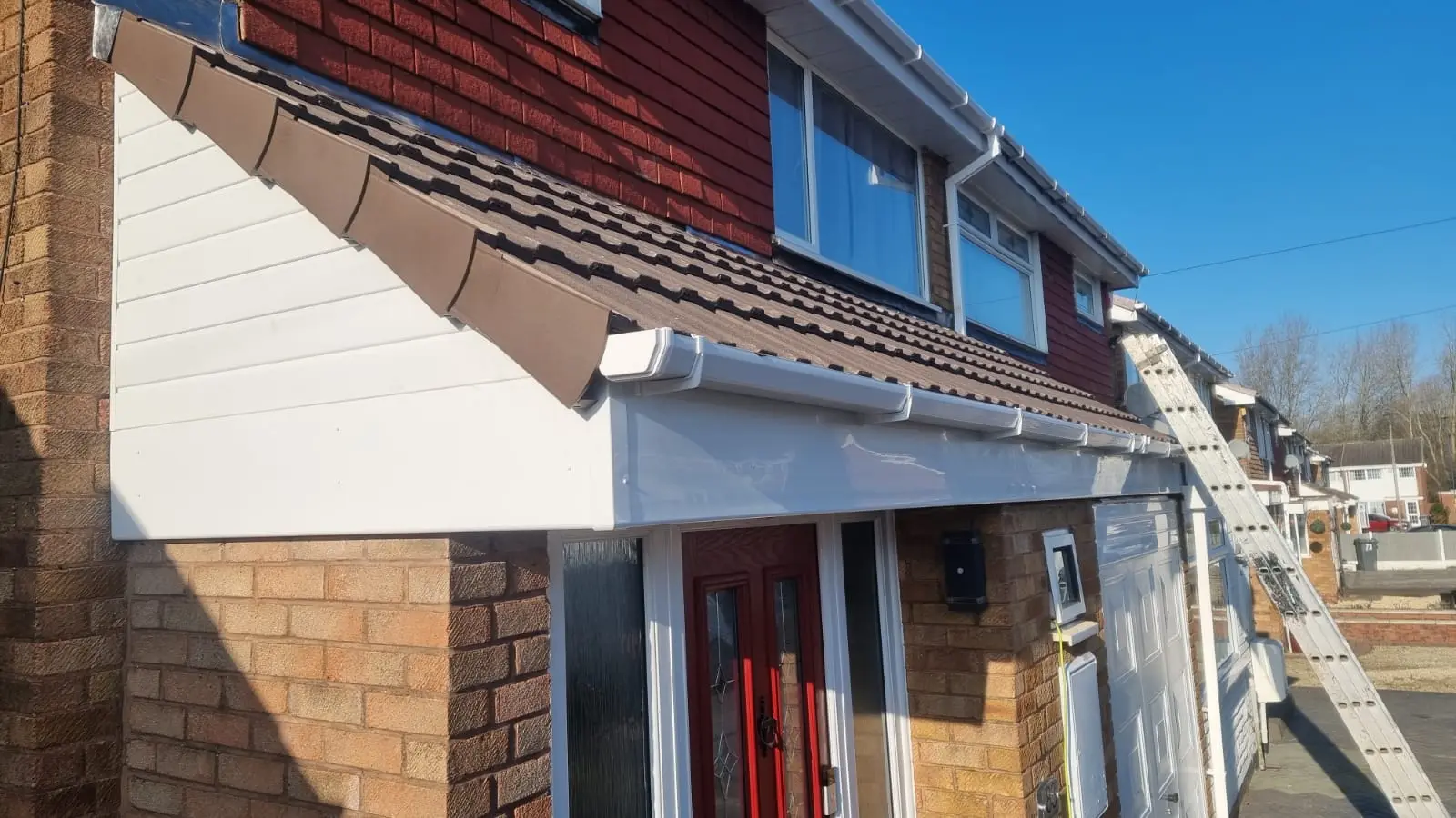 Completed white uPVC guttering and roofline on a Sutton Coldfield house Westridge Roofing