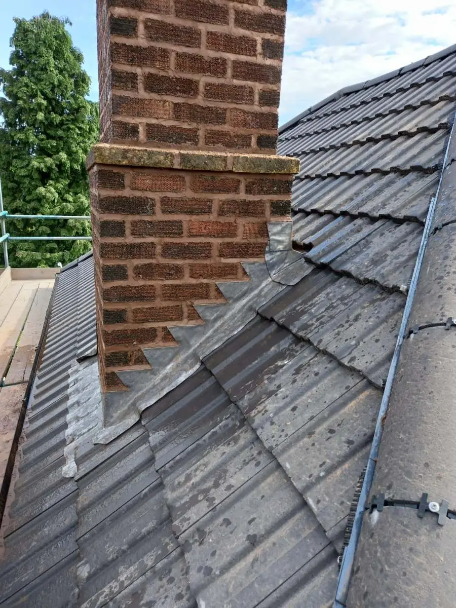 Lead flashing and chimney work on a tiled roof Westridge Roofing Birmingham