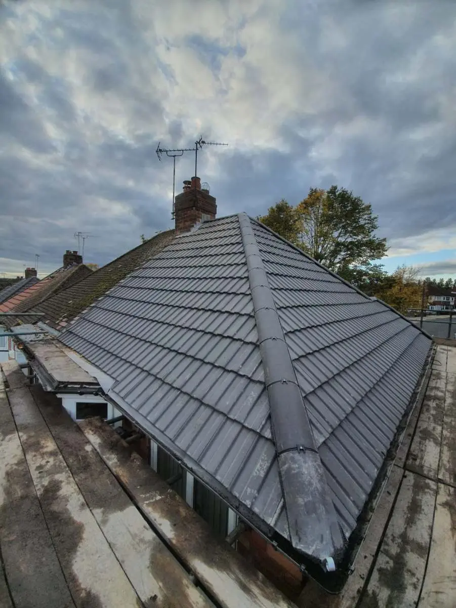 Old guttering being removed and replaced in Sutton Coldfield Westridge Roofing