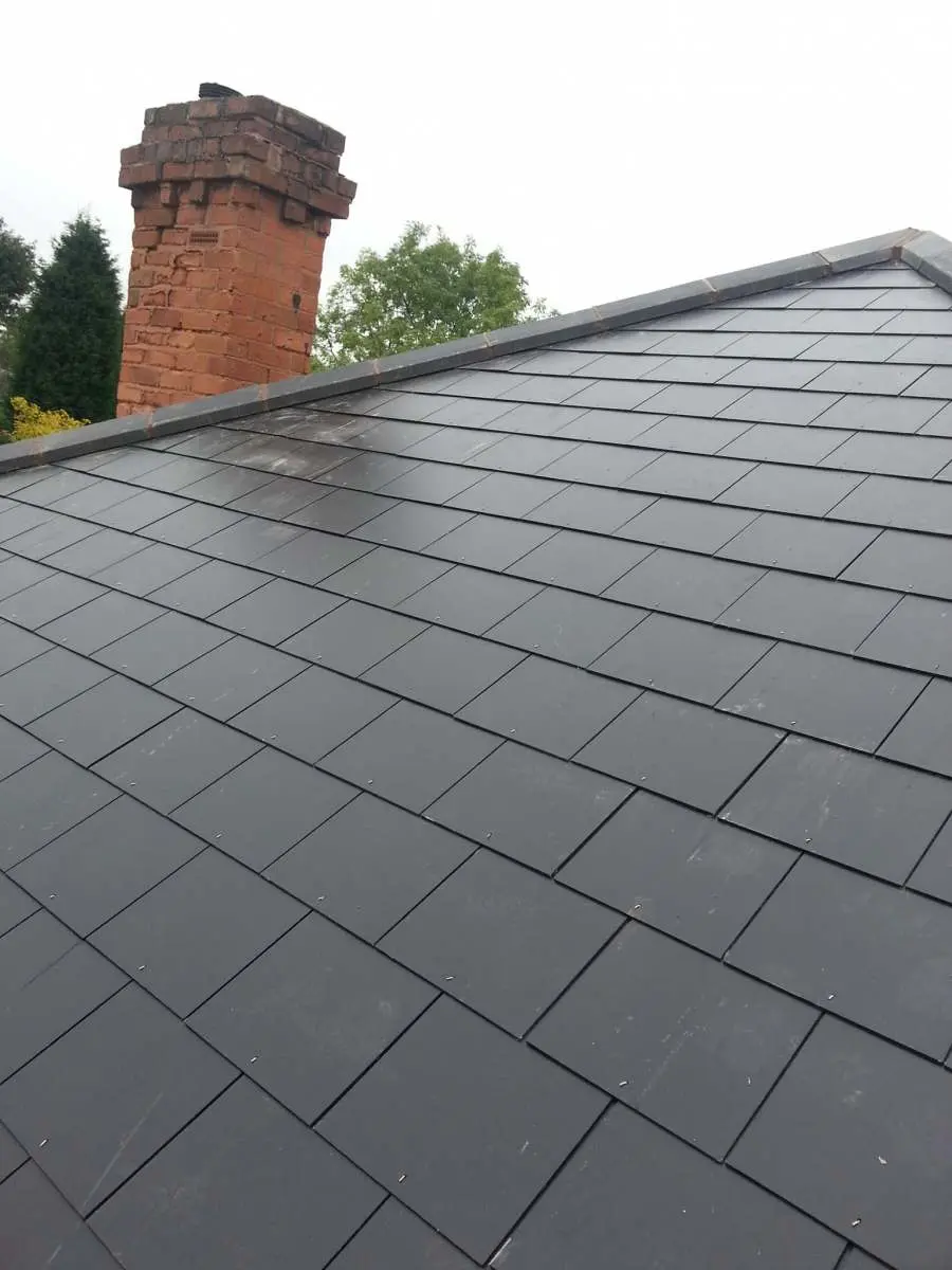 Damaged roof tiles and flashing identified during an inspection Westridge Roofing